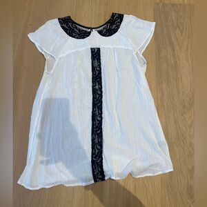 White top with black embroidery
